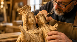 Bethlehem olive wood artisan carefully hand-carving a statue of the Virgin Mary and Child Jesus in a traditional workshop