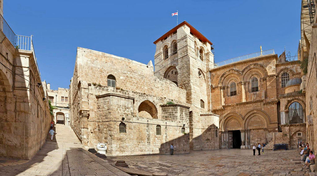 Church entrance on a sunny day with a flag on top