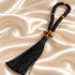 Black 50-knot Chotki arranged to show wooden beads and bronze-tone cross