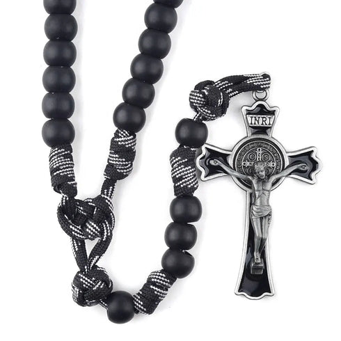 Handmade matte black 12mm acrylic bead with paracord rosary and St. Benedict crucifix on white background.