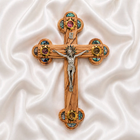 Budded Crucifix with Star of Bethlehem on a white amooth cloth