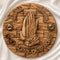 Olive wood blessing plate to hang on a wall with 'God Bless Our Home' inscription, praying hands and Holy Soil shown in detail.