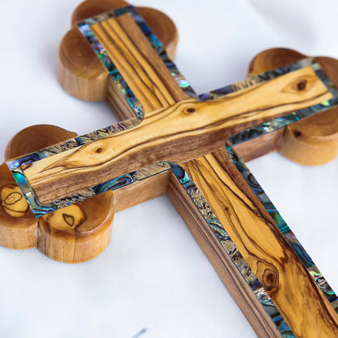 Handcrafted Eastern-style olive wood cross with nacre (mother of pearl) decorative details.