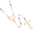 A gold-plated stainless steel rosary with white pearls, featuring an engraved heart and a cross.