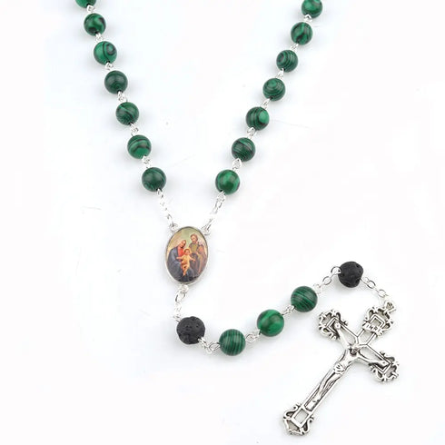 Holy Family Malachite centrepiece rosary with lava stone accents, photographed on clean white background.