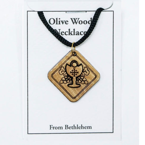 Olive Wood Necklace with a chalice and grapes design on a white card.