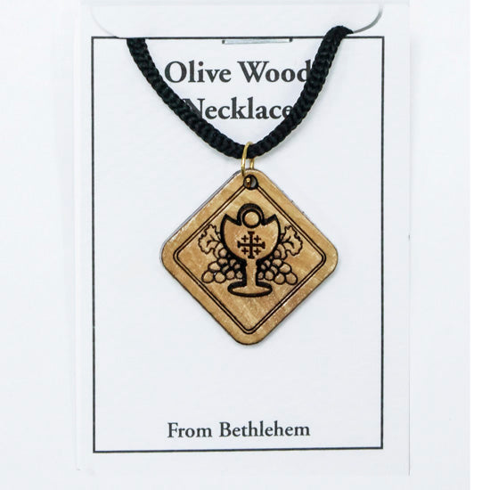 Olive Wood Necklace with a chalice and grapes design on a white card.