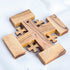 Back of an olive wood Jerusalem Cross set against a clean white background.