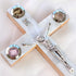 Polished Latin-style olive wood cross with silver crucifix, white Mother of Pearl and Four Elements, displayed on a white background.