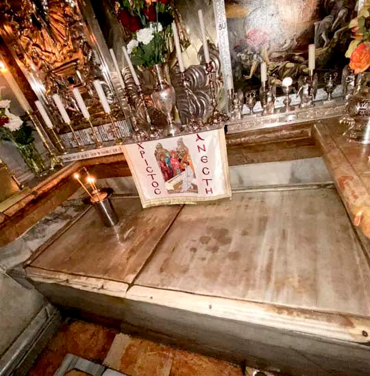 The innermost chamber of the Aedicula, The Most Holy Sepulchre, the stone of the Tomb of Jesus Christ.