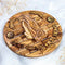 Olive wood blessing plate to hang on a wall with 'God Bless Our Home' inscription, Holy Soil, Praying hands shown in detail on. a white background.