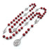 Seven Sorrows chaplet rosary with rose-scented 8mm wooden beads on white background.