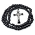 A shiny black acrylic rosary with a silver-colored Saint Benedict crucifix, designed for men.