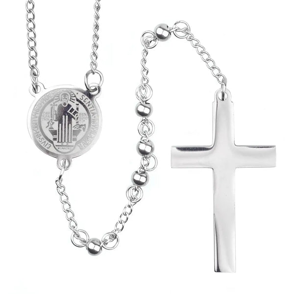 Shiny silver St.Benedict rosary with 4mm stainless steel beads and cross, laid on white background.