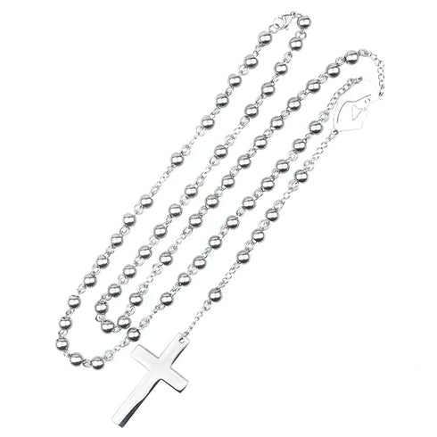 Elegant Virgin Mary rosary with stainless steel beads, photographed on white surface.