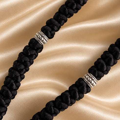 Close view of black 50-knot Komboskini prayer rope with silver-tone separators