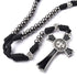 St. Benedict Rosary with silver beads, cross and black cord on a white background