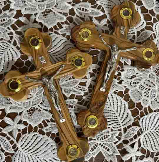 Two Olive Wood Budded Crosses with Four Holy Elements laid on a table