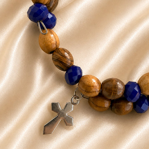 Men's beaded wrap bracelet with olive wood beads, dark blue crystal accents, cross charm