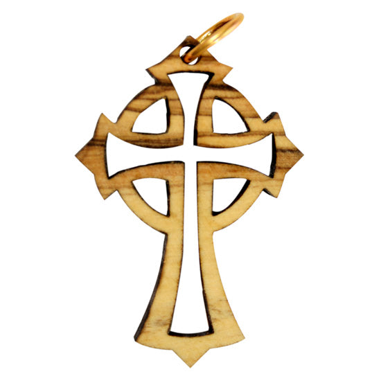 Wooden cross pendant on a white background