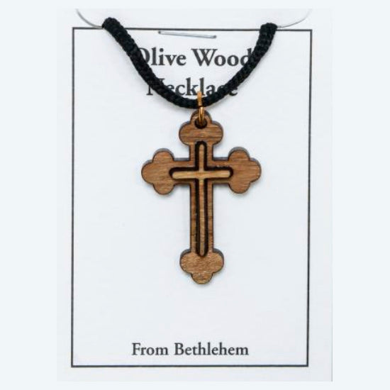 Wooden cross necklace on a card with 'Olive Wood Necklace From Bethlehem' text.