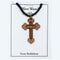 Wooden cross necklace on a card with 'Olive Wood Necklace From Bethlehem' text.