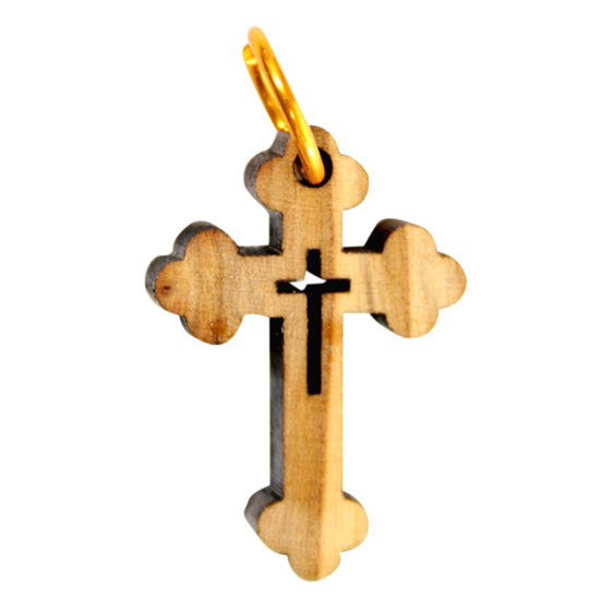 Wooden cross pendant with gold accents on a white background