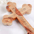 Zoomed image of the back of a handmade olive wood budded cross with "Jerusalem" and the Station of cross written on it, on a white bacground.
