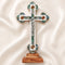 Large budded table cross with crucifix, mother of pearl inlay and Four Elements laid on white background.