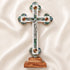 Large budded table cross with crucifix, mother of pearl inlay and Four Elements laid on white background.