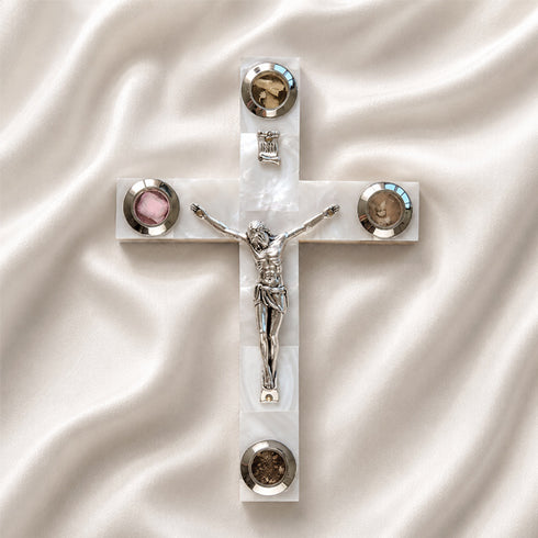 Olive wood Latin cross with crucifix, white Mother of Pearl inlay and Four Elements capsules, on a clean white surface.