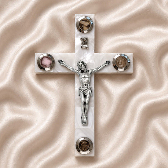 Olive wood Latin cross with crucifix, white Mother of Pearl inlay and Four Elements capsules, on a clean white surface.