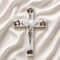 Olive wood Latin cross with crucifix, white Mother of Pearl inlay and Four Elements capsules, on a clean white surface.