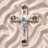 Olive wood Latin cross with crucifix, white Mother of Pearl inlay and Four Elements capsules, on a clean white surface.
