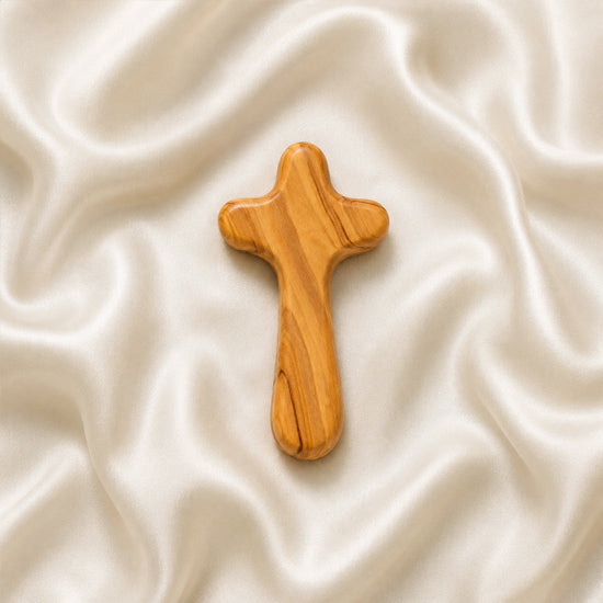 Olive wood Comfort Cross on white background