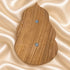 Back view of a Divine Mercy olive wood holy water font showing the natural wood grain and hanger