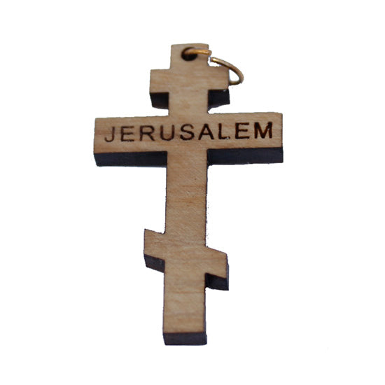 Wooden cross pendant with 'Jerusalem' engraved on a white background
