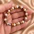 First Communion Olive Wood Bracelet with Pearlescent Beads & Cross