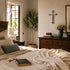 Cozy bedroom with bed, dresser, and decor elements