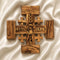 Handmade Olive wood Jerusalem Cross with "God Bless Our Home" and Christs portrait engraved set against a clean white background.