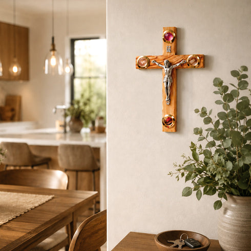 Wooden cross with Jesus Christ on the wall in a home setting