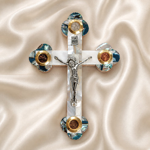 Budded olive wood cross with silver crucifix and white Nacre on white background.