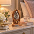 Holy Family olive wood plaque displayed in a bedroom, with warm decor softly blurred behind it
