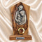 Holy Family olive wood plaque with natural grain and bark edge, shown upright against a neutral background