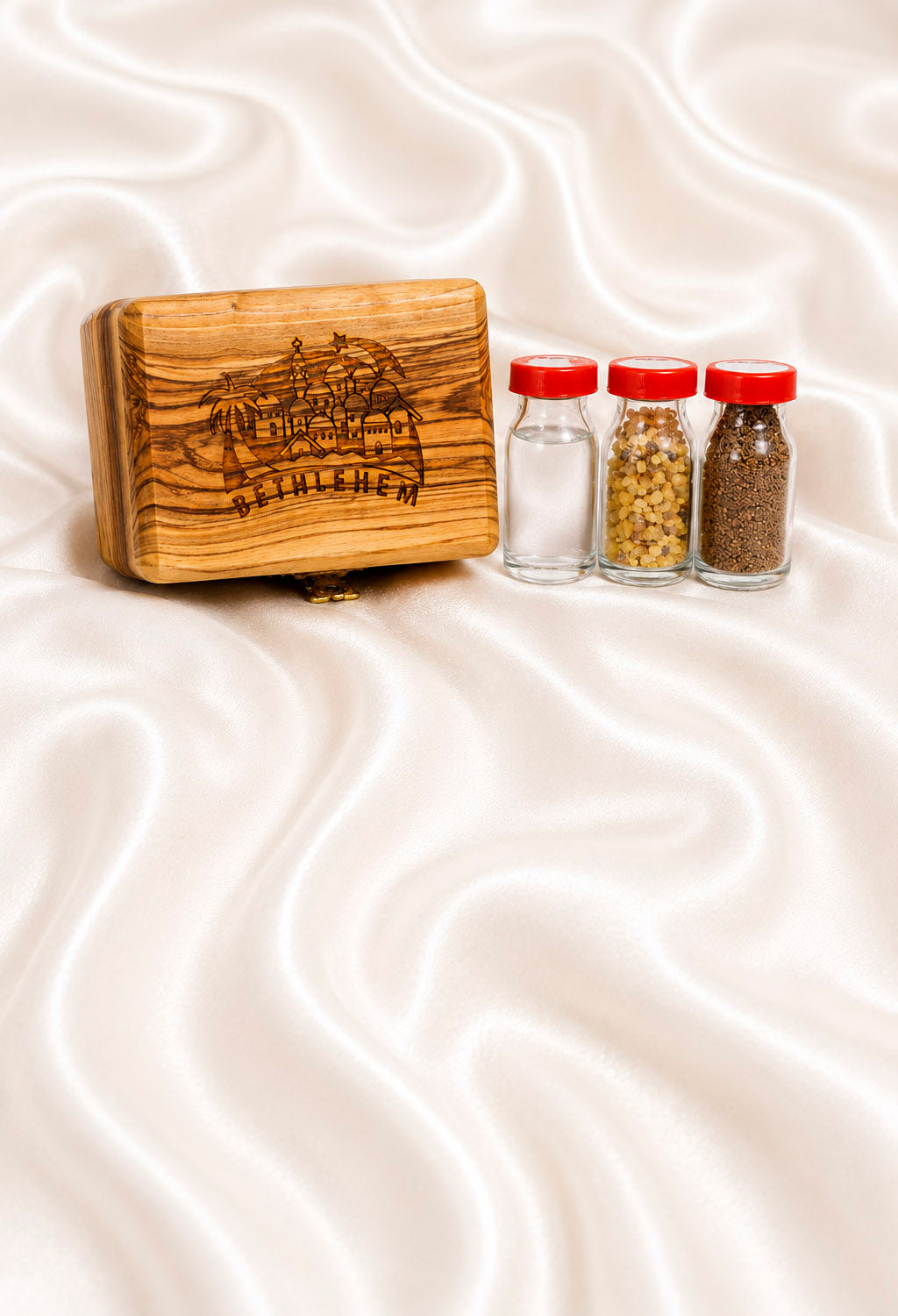 Bethlehem wooden box with three vials with red cap