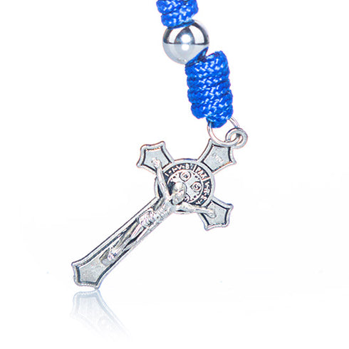 Image of a small blue and iron St. Benedict keychain rosary with a crucifix, against white background.