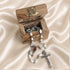 Olive wood rosary box open with white pearl beads and silver crucifix cross