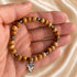 Olive Wood & Hematite Bracelet with Holy Spirit Dove Cross