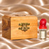 Olive wood keepsake box with holy water bottle shown in a detailed product view