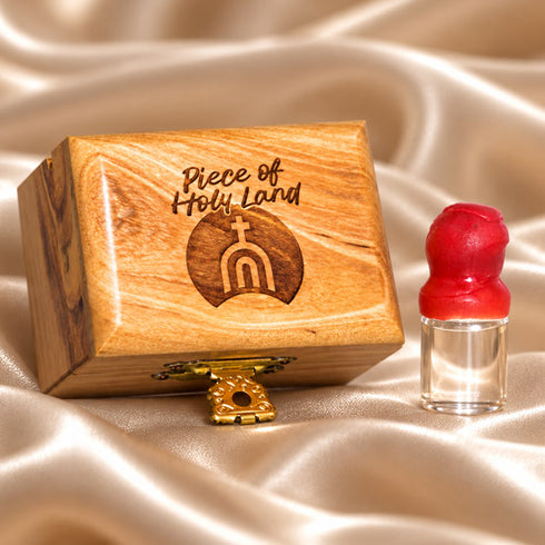 Holy water bottle presented in a handcrafted olive wood keepsake box
